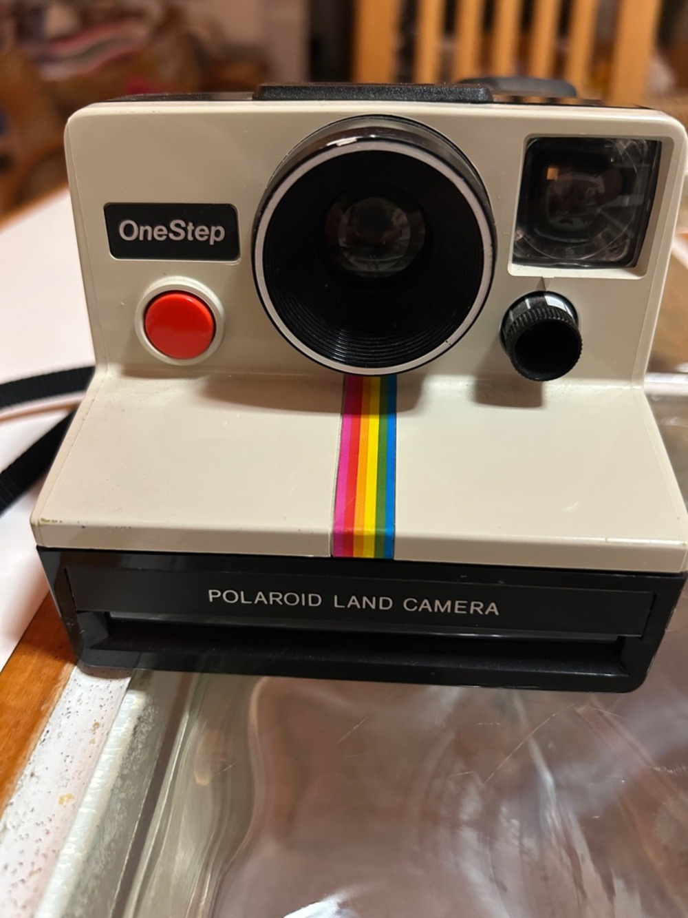 !!! Vintage Polaroid OneStep Land Camera with rainbow stripe and red shutter.